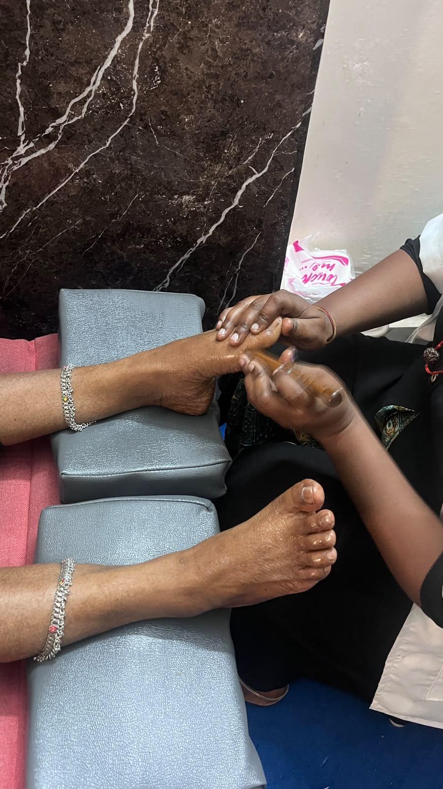 Relaxation and wellness through foot reflexology at JSV Madurai